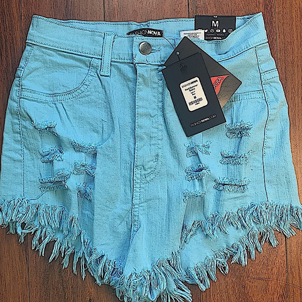 NEW WITH TAGS FASHIONNOVA BLUE FRILL HIGH RISE RIPPED JEAN SHORTS SIZE MEDIUM